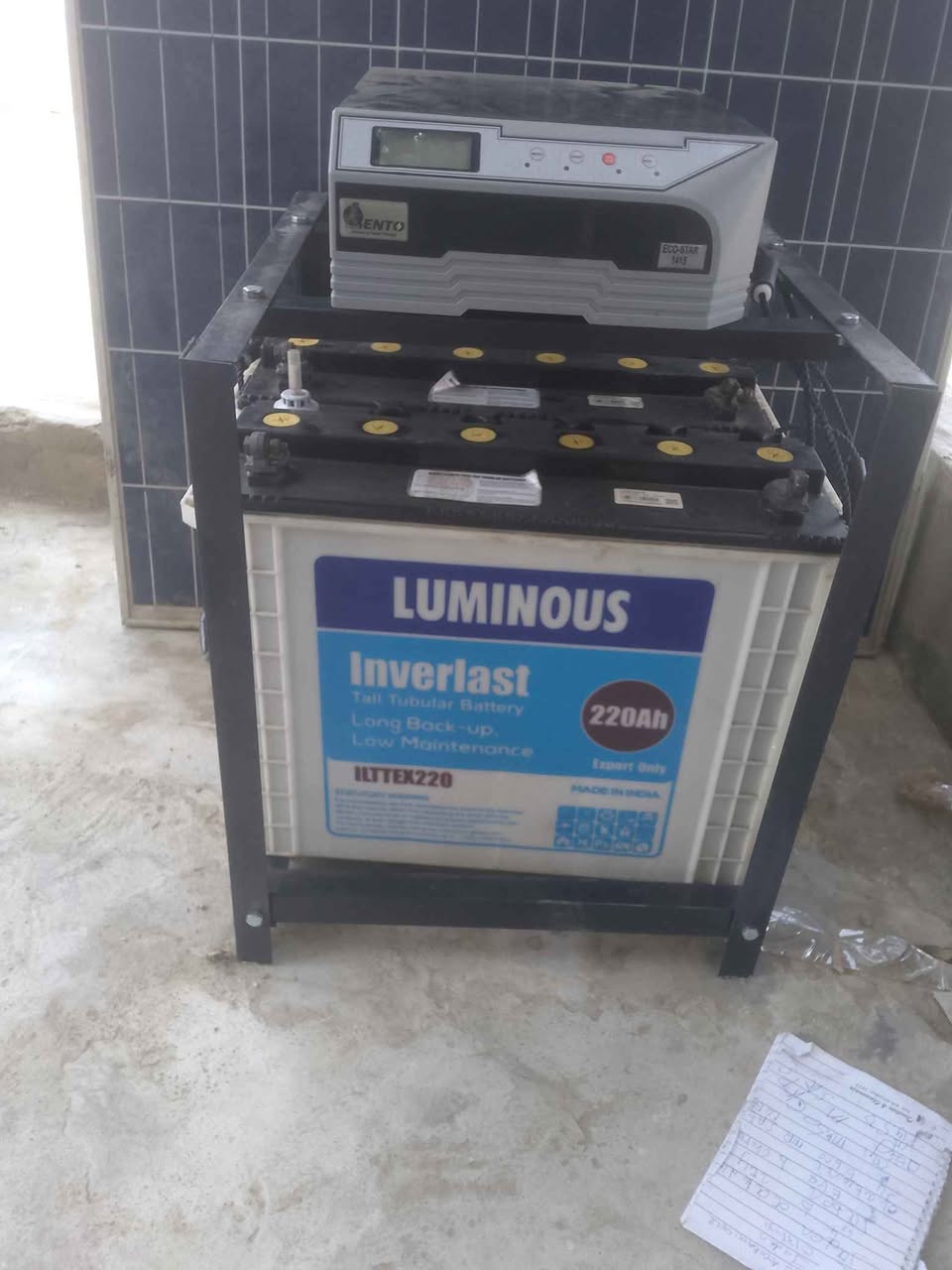 A picture of 1 4kva 12v with 2 batteries and 2 panels