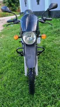 A picture of NAUZA BOXER BM 125 TSH 950 000 PIGA WHTSPP 0718702567