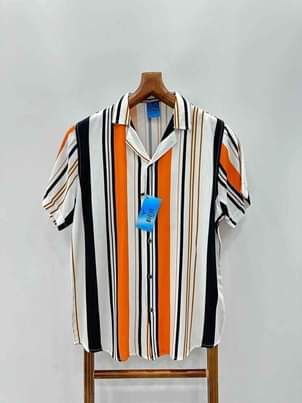 A picture of Bulamu vintage shirts Sizes available Call whatsapp 0759636169
