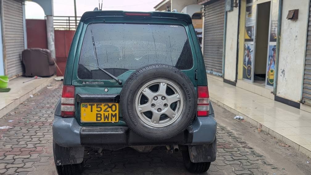 A picture of MITSUBISHI PAJERO MINI FULL DOCUMENT FULL AC BEI 4M LOCATION