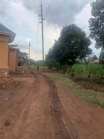 A picture of 50 130ft Wobulenzi Busula main road plot for sale Kampala