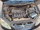 A picture of I present to you this 04 Corolla everything working perfectly
