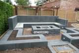 A picture of DESIGN WITH US YOUR COMPOUND outdoor bench building paver installation