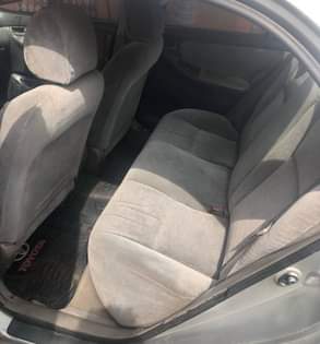 A picture of Clean Nigerian Used Silver Toyota Corolla 2003 Repainted Fabric interior
