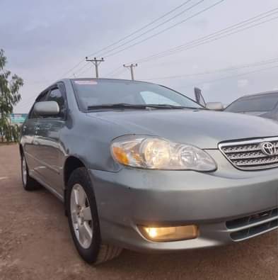 A picture of URGENTLY NEEDS MONEY CLEAN REGISTERED TOYOTA COROLLA BUY AND TRAVEL