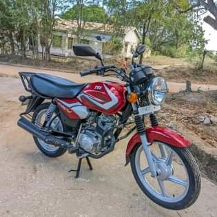 A picture of TVs 125 full documents TSH 850 000 Nipigie au Whatsapp