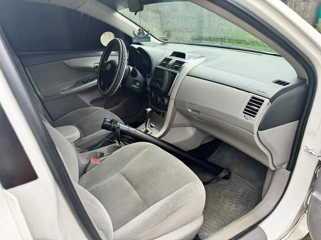 A picture of Nigerian used 2012 Toyota Corolla White color
