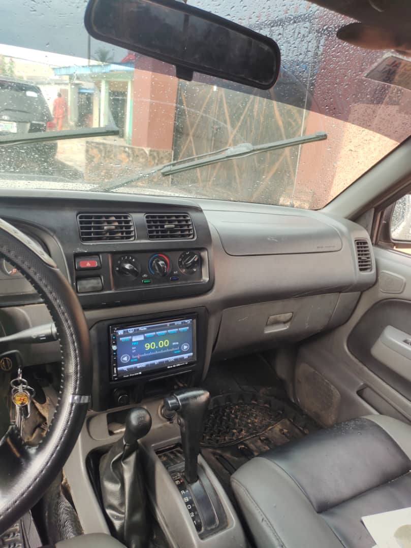 A picture of Nissan frontier with Chilling AC for sale