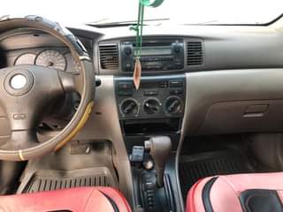 A picture of Neatly used 2007 Toyota Corolla with unscrewed engine painted once