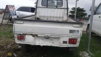 A picture of Belgium standard Hijet pick up Engine Gear Price 3 6m