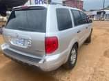 A picture of Honda pilot three rolls LESS THAN A YEAR REGISTERED
