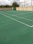 A picture of Tar surfaces and Tennis court
