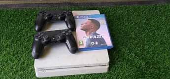 A picture of PS4 SLIM NA PAD ZAKE MBILI NA WAYA ZAKE