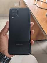 A picture of SAMSUNG GALAXY A12 BADO MPYA INAKILA KITU CHAKE BOX LISIT
