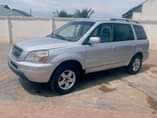 A picture of Honda pilot 2004 model for sale engine and gear is