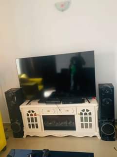 A picture of Hisense Smart TV 65 inches Price 220k LG Subwoofer 1250