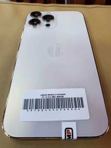 A picture of iPhone 13 pro max 256 GB gold 87 battery original