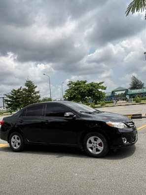 A picture of GIVEAWAY DEAL TOYOTA COROLLA 2010 MILEAGE 72 000 NEWLY PAINTED