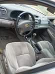 A picture of Toyota Camry 2004 registered features engine needs change of oil