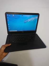 A picture of slim laptop dell core i3