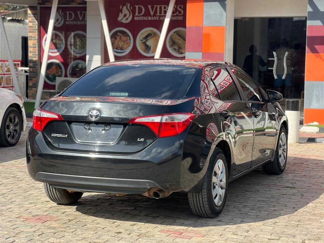 A picture of EXTREMELY CLEAN TOYOTA COROLLA 2015 MODEL ORIGINAL CUSTOM DUTY TWO
