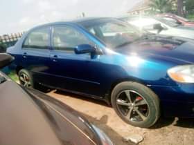 A picture of Make Toyota Model Corolla Year 2004 Color Blue Engine Perfect