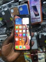 A picture of Original IPhone XsMax 950000 256gb storage Battery health 86 No