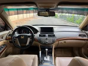 A picture of USED HONDA ACCORD WINE 2009 MODEL WITH SUNROOF AT KADUNA