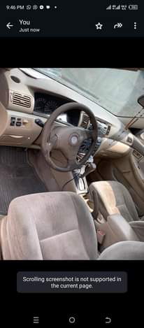 A picture of Toyota Corolla LE year 2004 engine and transmission and ac