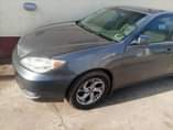 A picture of The three cars here is under distress sale Camry 2005