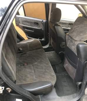 A picture of Clean Nigerian Used Honda CRV 2003 First body Fabric interior
