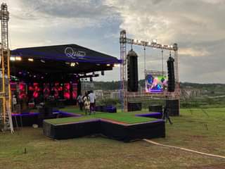 A picture of Stage PA system screens and lights