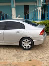 A picture of Awuff deal Super clean honda civic irobot Accident free AC