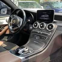 A picture of REGISTERED 2016 MERCEDES BENZ C300 COUPE Grey on Brown Interior