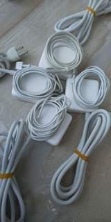 A picture of Apple orignal adapter MagSafe MagSafe2 and Type C