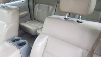 A picture of 2006 Ford F150 Lariat First User Untampered engine and gear