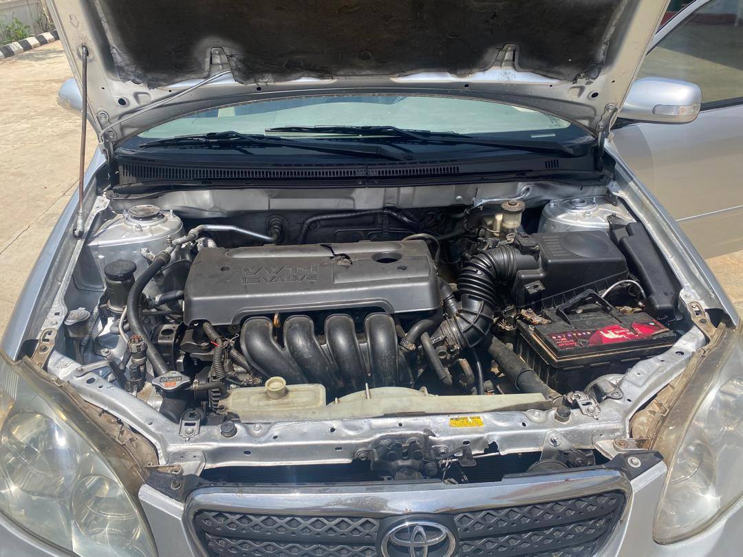 A picture of Newly painted 2006 Toyota Corolla with sound engine and gear