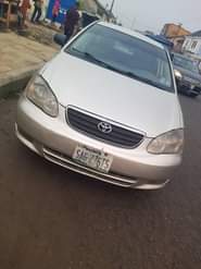 A picture of EXTREMELY CLEAN TOYOTA COROLLA 2004 model Engine percent sound Gear