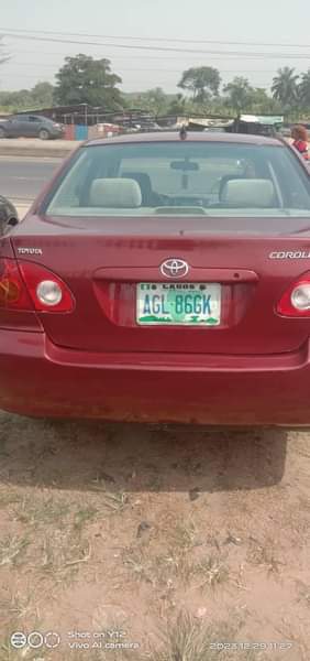 A picture of Christmas Deal Sharp Red Toyota Corolla 2005 First Body Engine