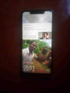 A picture of Techno spark 3 with 20000mha power bank for swap with