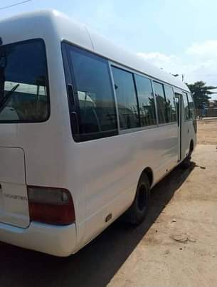 A picture of Tokunbo white Toyota coaster bus for sale... diesel engine...2016 model