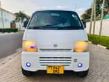 A picture of SUZUKI CARRY DMG Cc 650 Rim Sports Manual gear Bei