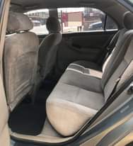 A picture of Clean Nigerian Used Grey Toyota Corolla 2003 Repainted Fabric interior