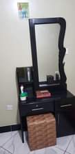 A picture of Matress dressing mirror and center carpet