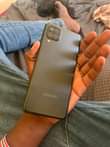 A picture of Samsung A12 black color Gb 64 Ram 4 Battery mAh