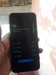 A picture of Samsung galaxy J6 small crack side fingerprint