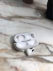 A picture of AirPods Pro original model A2084 100 wats up or call