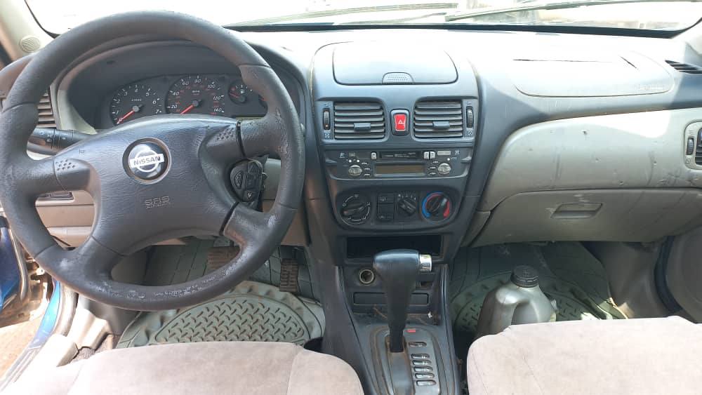 A picture of Nissan Almira Lift Back 2003 Model First Body 4plugs Engine