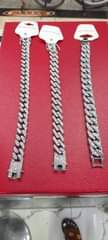 A picture of Iced chains and bracelets