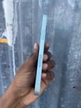 A picture of I phone 12 plain 64gb Face id ok True tone